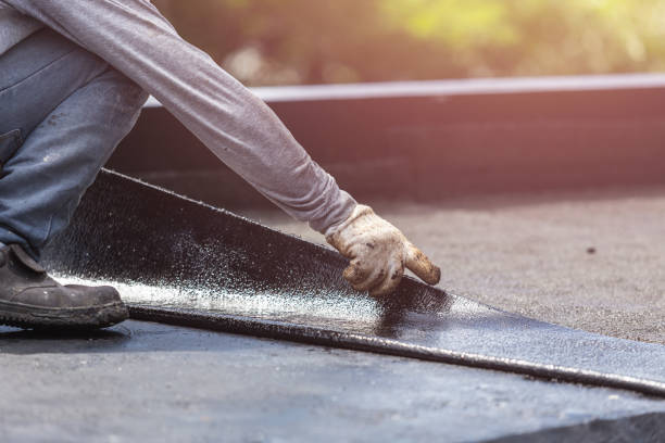 Professional Basement Waterproofing technician working in Atwood, KS